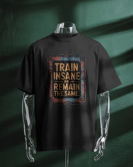 Train Insane: Men's Oversized T-Shirt Oversized Standard T-Shirt Mango Kulfi Black S